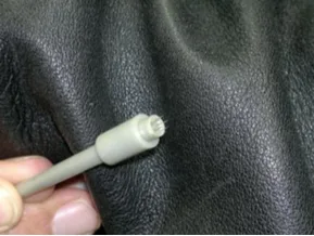 Fig 3. Motorised microneedling pen (Dermapen-type) cartridge tip. The needles enter and exit perpendicular with vertical oscillation, producing a clean channel at an adjustable, uniform depth, the geometric argument for the pen over the roller.